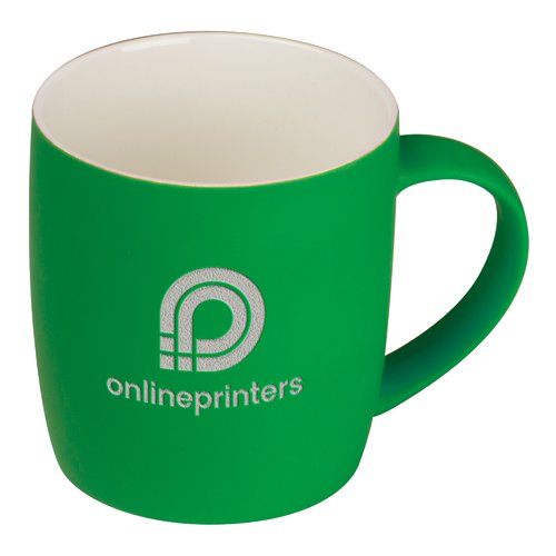 Grüne Keramiktasse mit abgerundeten Kanten und Henkel.