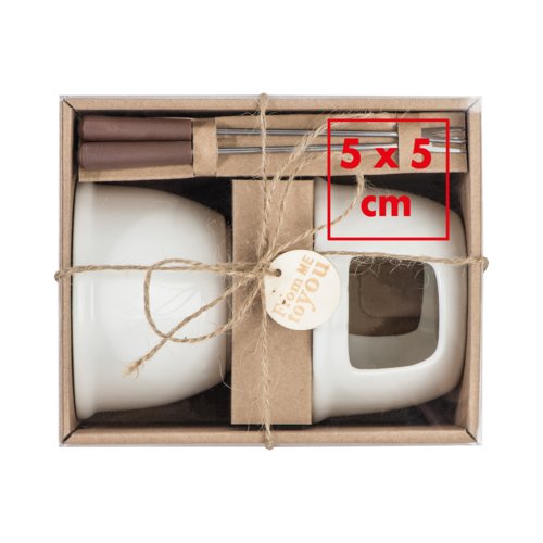 Weies Keramik Schokoladenfondue-Set mit Gabeln.