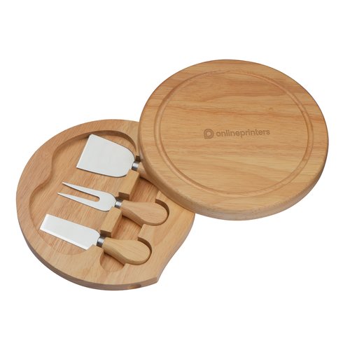 Beiges Ksebrett aus Holz mit passenden Ksemessern.