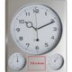 Silberne Kunststoff Wanduhr mit Thermometer und Hygrometer.